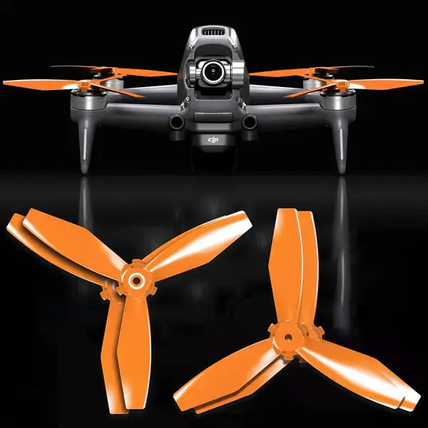 DJI FPV drone with orange Ludicrous upgrade propellers set, showcasing performance enhancements for faster flight.