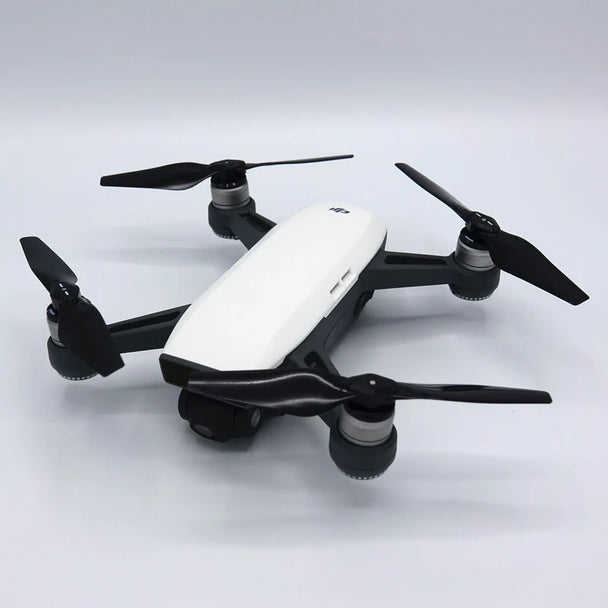 DJI Spark drone with STEALTH upgrade propellers for low-noise, improved flight performance.